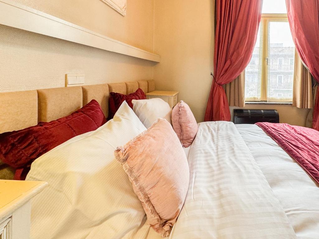 Postel nebo postele na pokoji v ubytování Hotel Botaniek