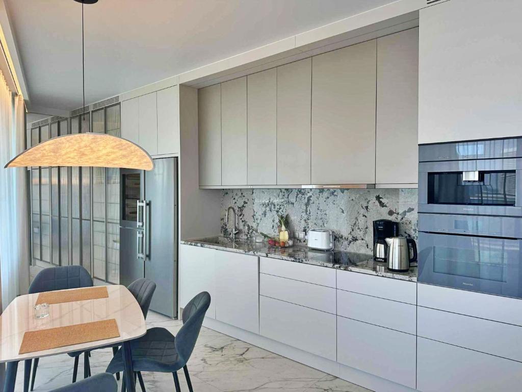 Kuchyň nebo kuchyňský kout v ubytování Wave by Baltic Home