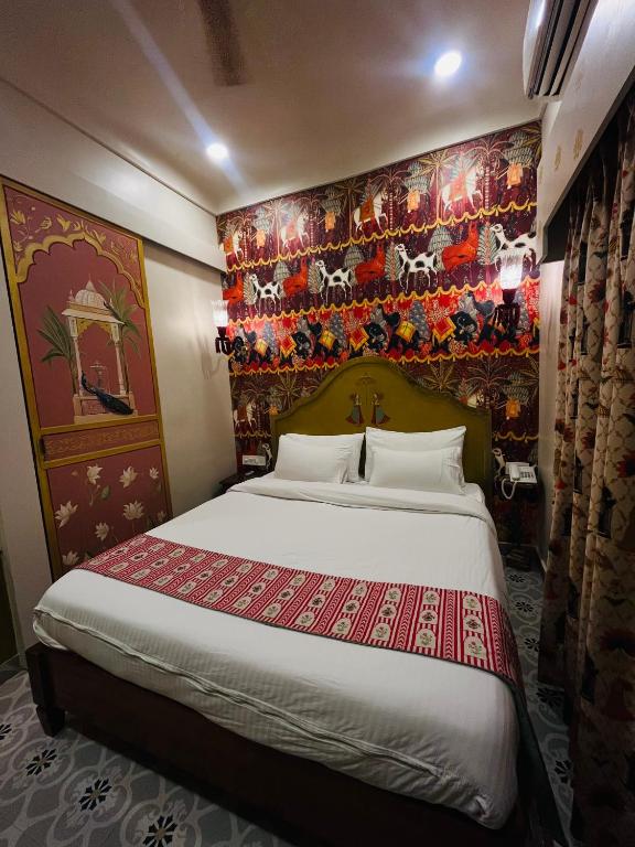 Postel nebo postele na pokoji v ubytování Stay Banaras - A Boutique Hotel