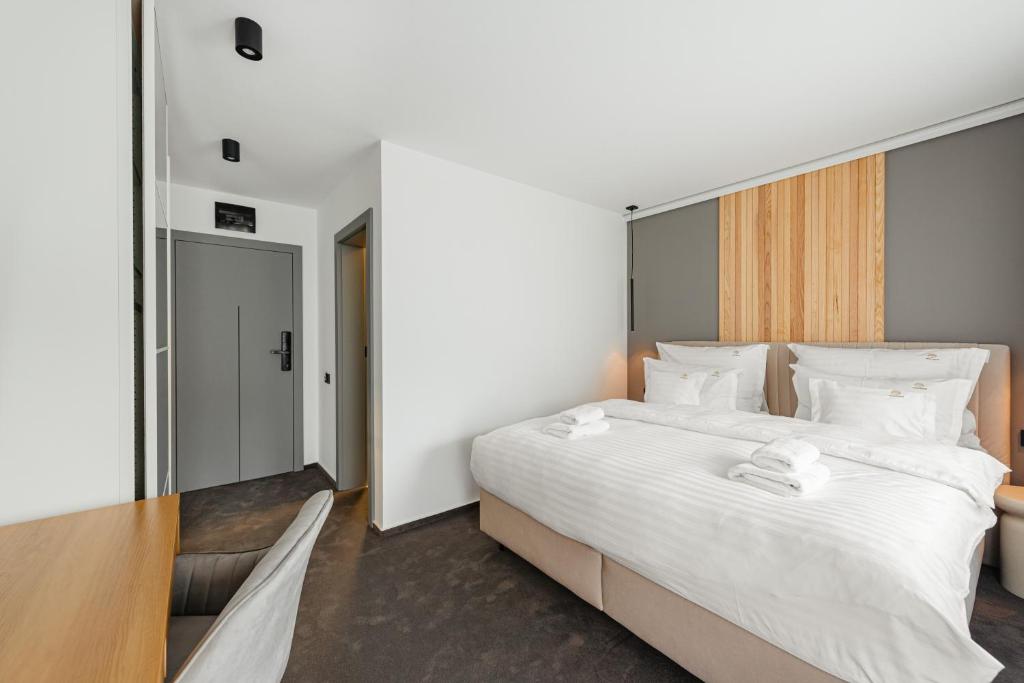 Postel nebo postele na pokoji v ubytování Terra Resort