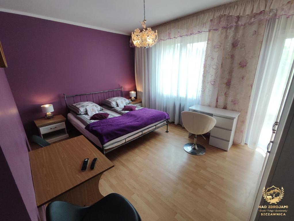 Posteľ alebo postele v izbe v ubytovaní "Nad Zdrojami" Pokoje Kowalczyk