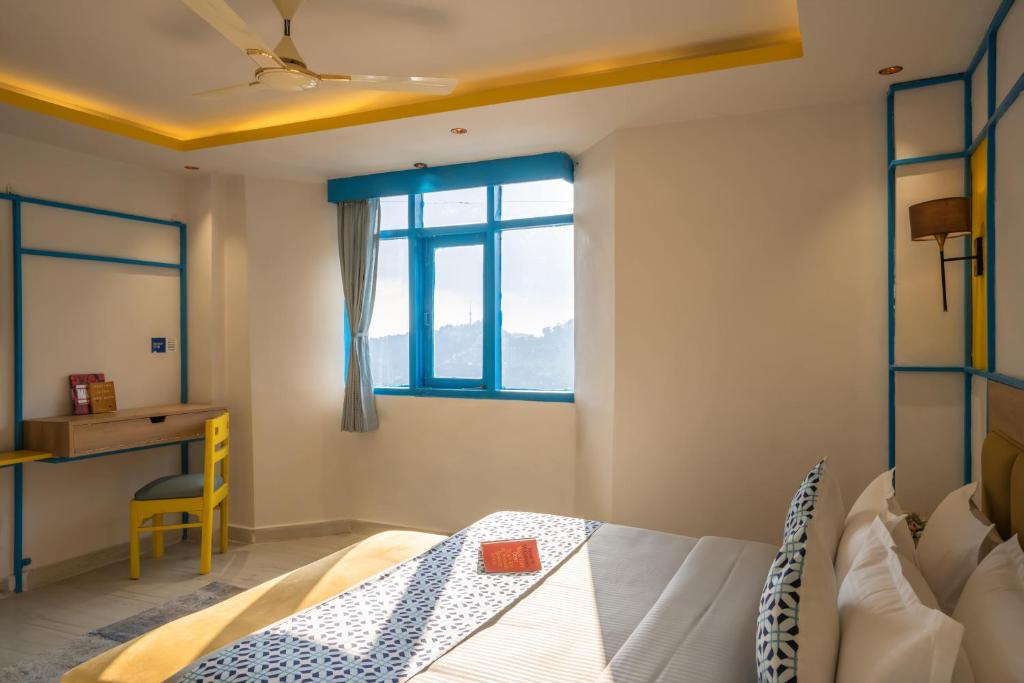 Postel nebo postele na pokoji v ubytování Shalom Backpackers Shimla