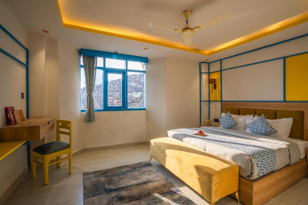 Postel nebo postele na pokoji v ubytování Shalom Backpackers Shimla