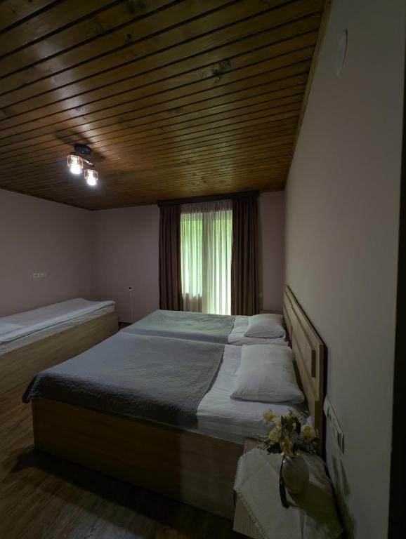 Postel nebo postele na pokoji v ubytování Lisaneli