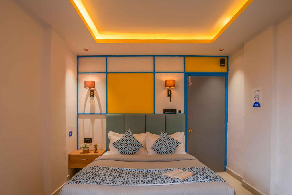Postel nebo postele na pokoji v ubytování Shalom Backpackers Shimla