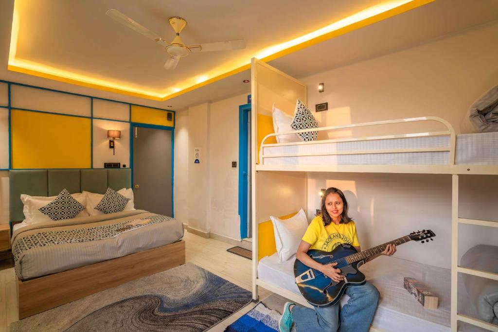 Postel nebo postele na pokoji v ubytování Shalom Backpackers Shimla