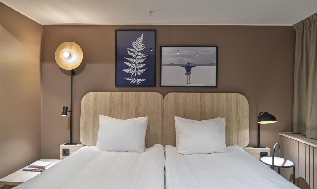 Postel nebo postele na pokoji v ubytování Scandic Sjöfartshotellet