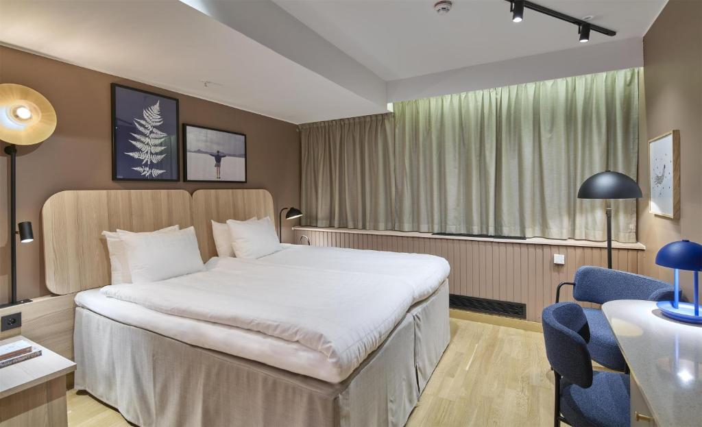 Postel nebo postele na pokoji v ubytování Scandic Sjöfartshotellet
