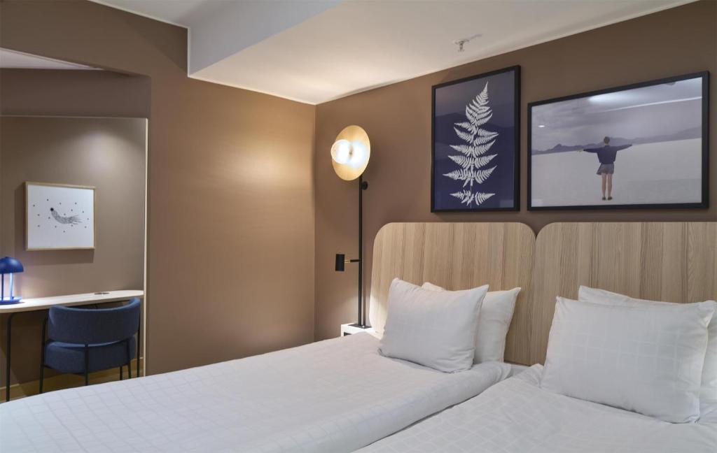 Postel nebo postele na pokoji v ubytování Scandic Sjöfartshotellet