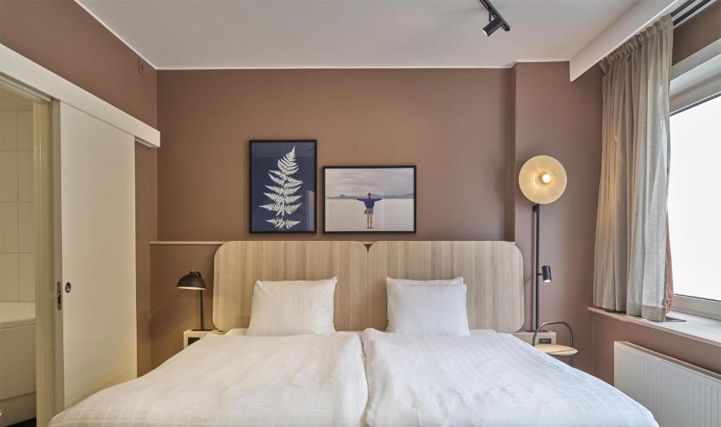 Postel nebo postele na pokoji v ubytování Scandic Sjöfartshotellet