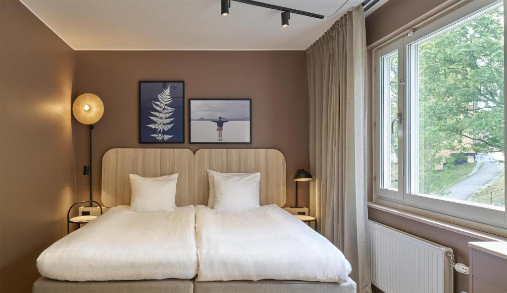 Postel nebo postele na pokoji v ubytování Scandic Sjöfartshotellet