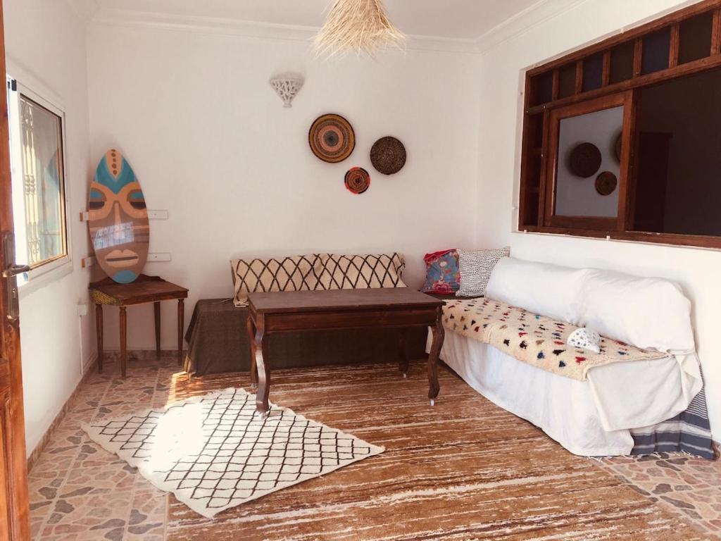 Ένα ή περισσότερα κρεβάτια σε δωμάτιο στο Banana beach house with garden!