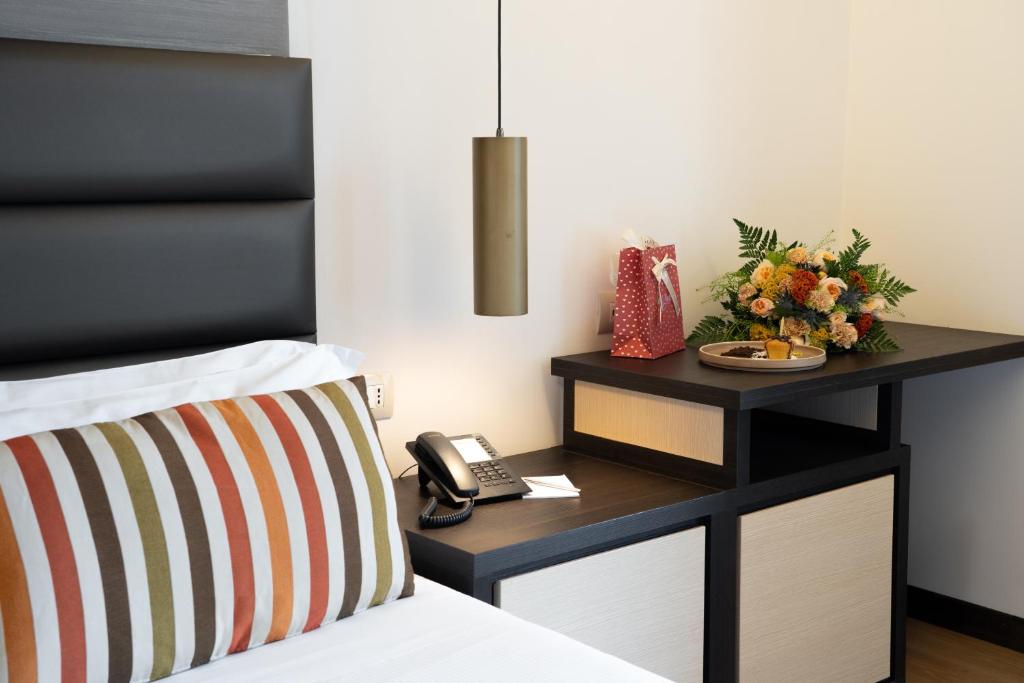 Postel nebo postele na pokoji v ubytování Warmthotel