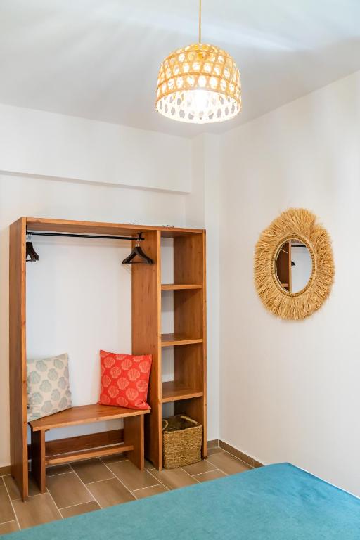 Postel nebo postele na pokoji v ubytování Anemos Guest Apts