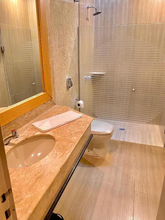 Koupelna v ubytování Pousada e Motel Blue Inn