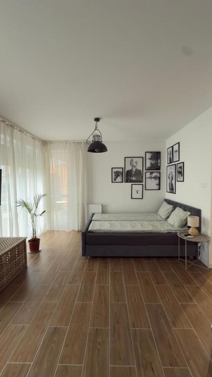Ένα ή περισσότερα κρεβάτια σε δωμάτιο στο Apartament Przytulny 3, self check-in