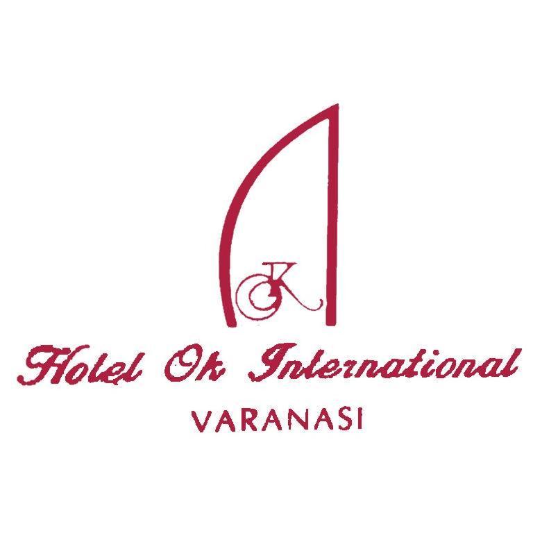 a logo for a hotel or international vanominium at Hotel OK International in Varanasi