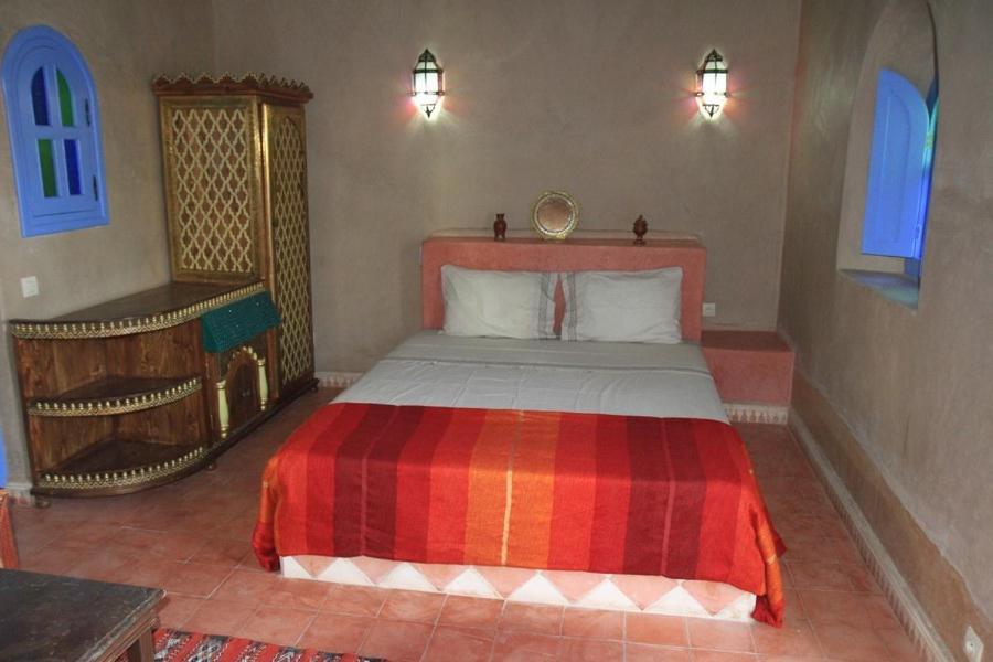Letto o letti in una camera di Riad Dar Dzahra