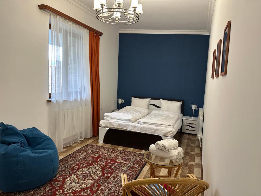 Postel nebo postele na pokoji v ubytování TAGANI Guest House