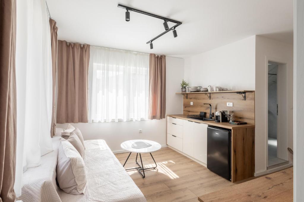 Η κουζίνα ή μικρή κουζίνα στο Apartments CityZen