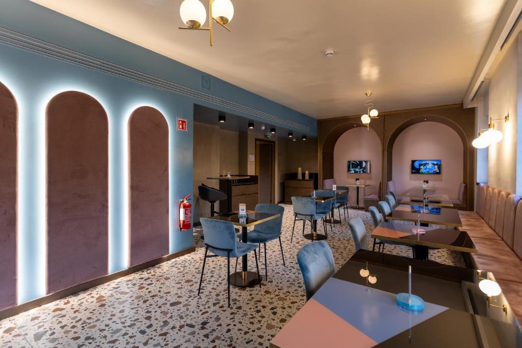 TV a/nebo společenská místnost v ubytování AXYHOTELS InnStyle Milano