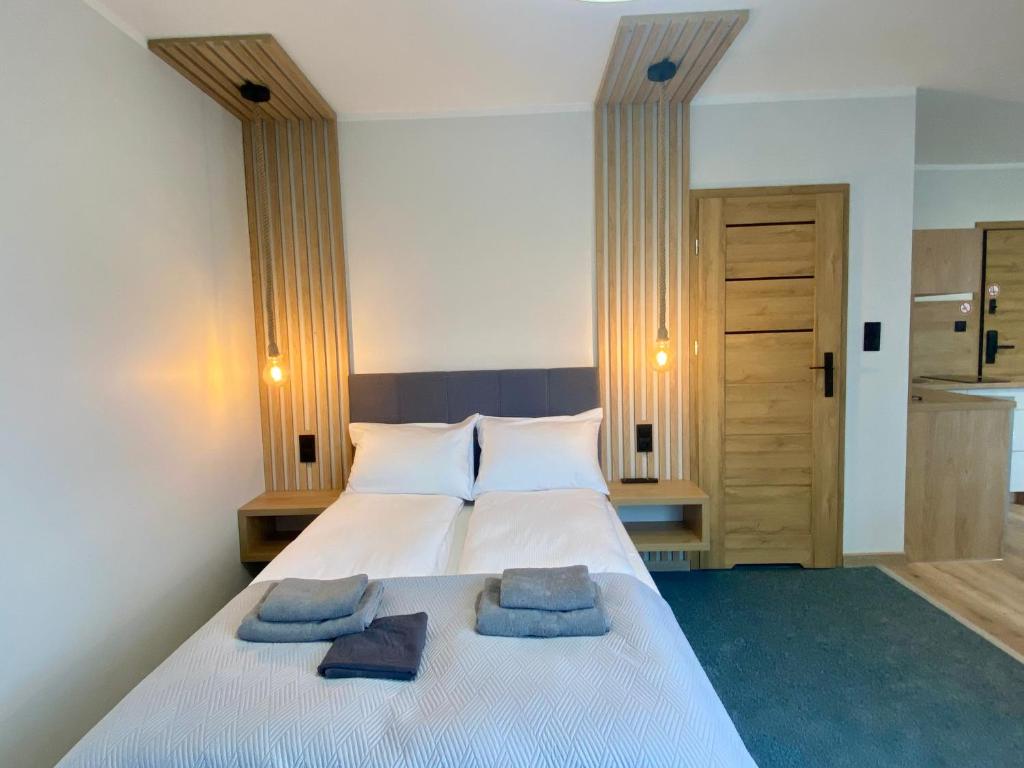 Postel nebo postele na pokoji v ubytování "Willa Octavia" Apartamenty , Pokoje