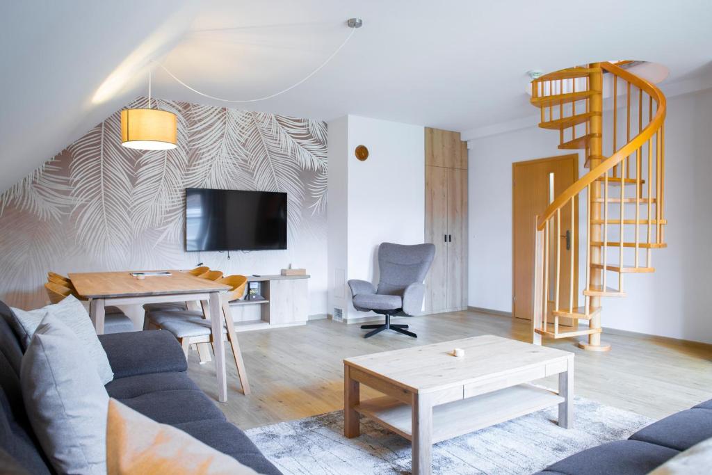 TV a/nebo společenská místnost v ubytování Amenity Hotel & Resort Špindlerův Mlýn