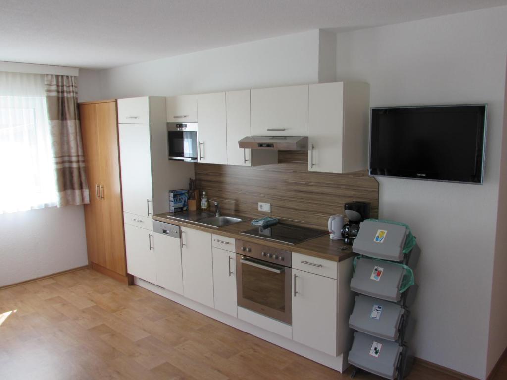 Kuchyň nebo kuchyňský kout v ubytování Apart Alexandra