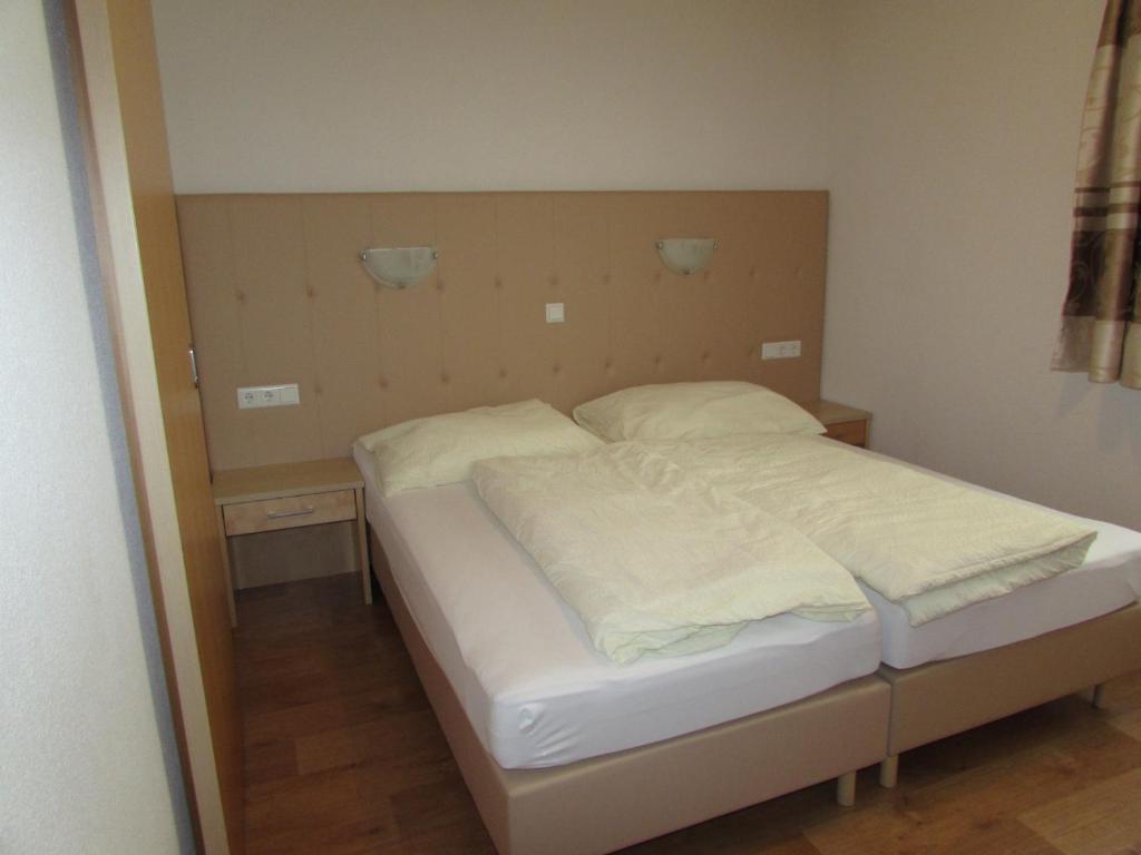 Postel nebo postele na pokoji v ubytování Apart Alexandra