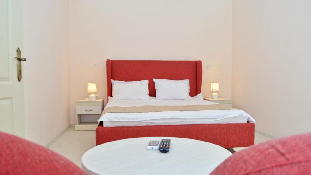 Postel nebo postele na pokoji v ubytování Hotel Mykonos