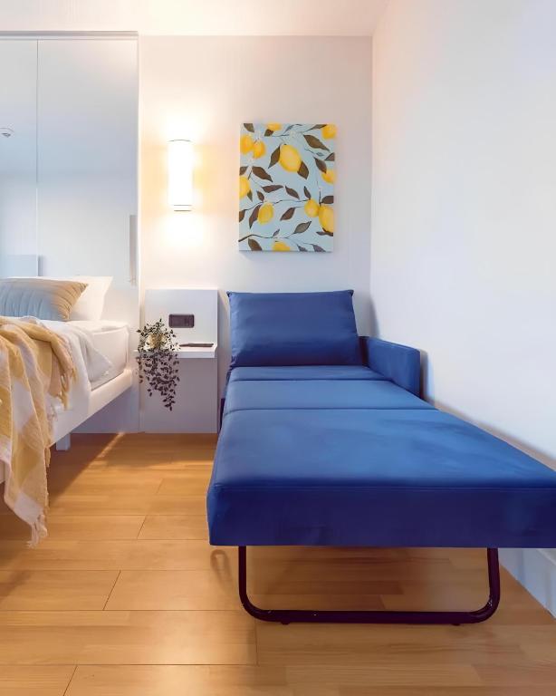 Postel nebo postele na pokoji v ubytování Panorama Orbi City Aparthotel