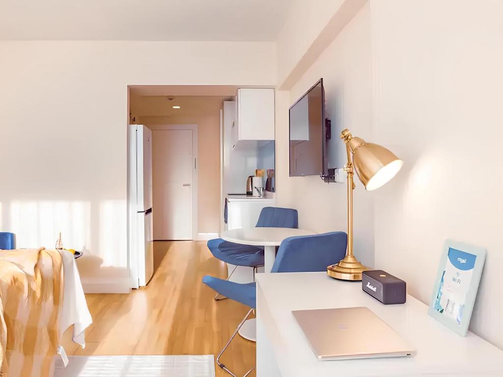 TV a/nebo společenská místnost v ubytování Panorama Orbi City Aparthotel