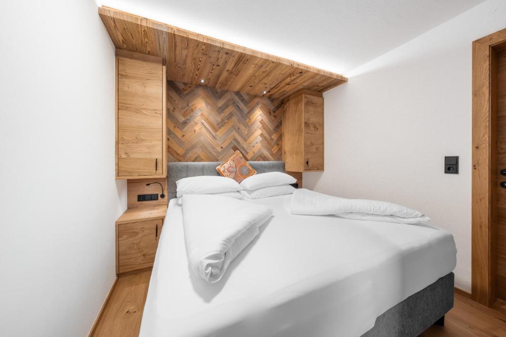 Postel nebo postele na pokoji v ubytování Appartements Retthäusl