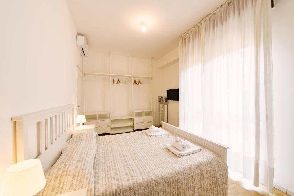 Posteľ alebo postele v izbe v ubytovaní Residenza Le Mura