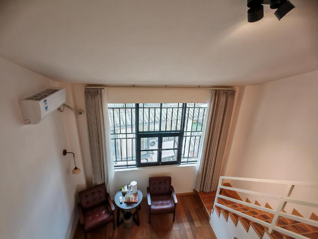 Istumisnurk majutusasutuses Guilin Camphor Country House -Free pick up service