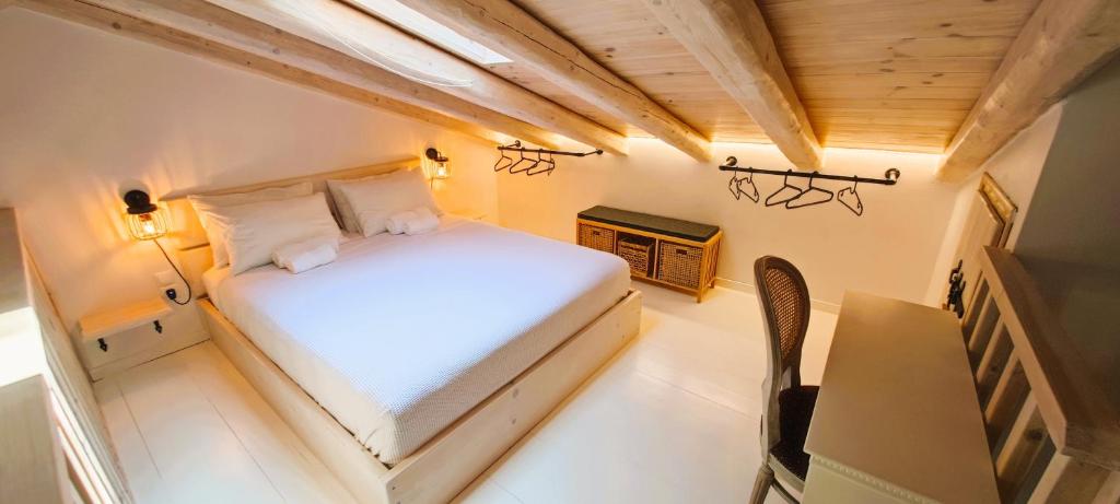 Voodi või voodid majutusasutuse Chrisanthi's Cottage toas