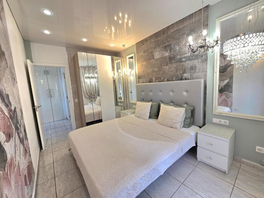 Posteľ alebo postele v izbe v ubytovaní Apartment Orlando Sea