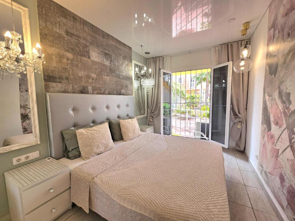 Posteľ alebo postele v izbe v ubytovaní Apartment Orlando Sea