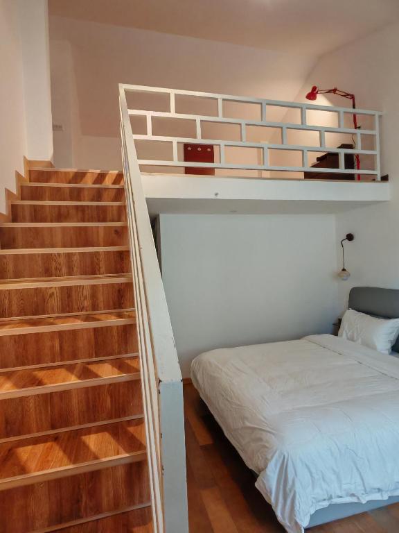 Voodi või voodid majutusasutuse Guilin Camphor Country House -Free pick up service toas