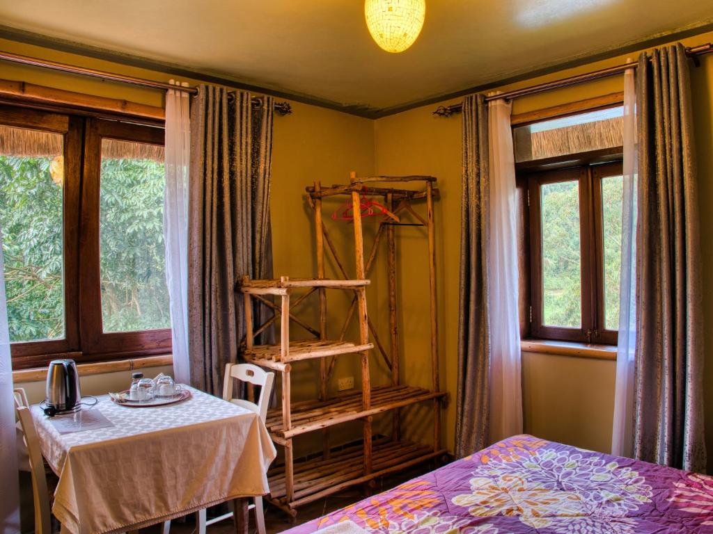 Postel nebo postele na pokoji v ubytování Birdnest Resort