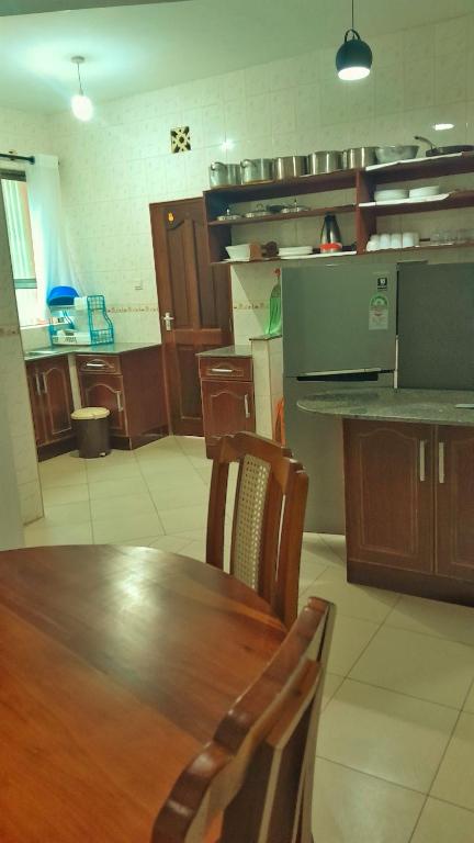 Kuchyň nebo kuchyňský kout v ubytování Shanzu Oceanline Suites