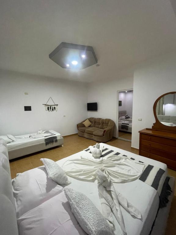 Postel nebo postele na pokoji v ubytování Hotel Soan