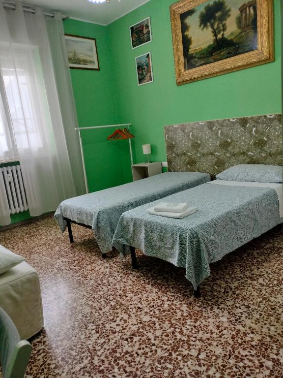 Postel nebo postele na pokoji v ubytování Mini Room Pero