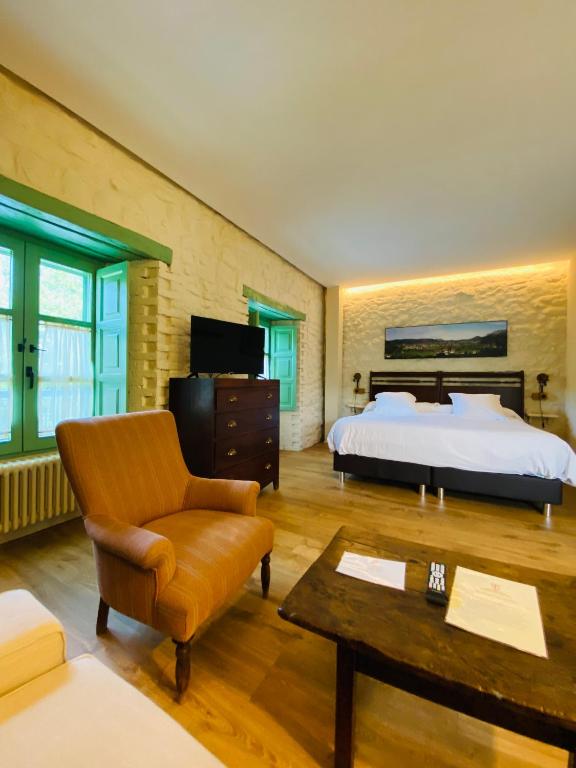 Letto o letti in una camera di Posada La Torre de La Quintana