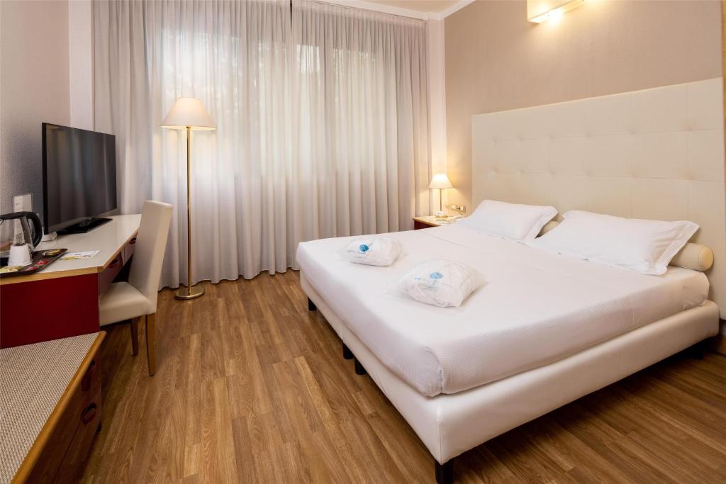 Łóżko lub łóżka w pokoju w obiekcie Best Western Air Hotel Linate