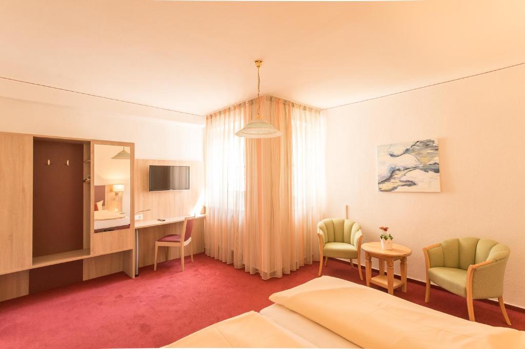 TV a/nebo společenská místnost v ubytování Hotel Leander
