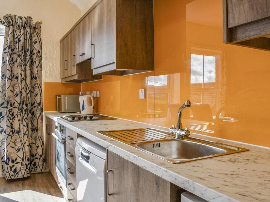 Kuchyň nebo kuchyňský kout v ubytování Grosmont Apartment