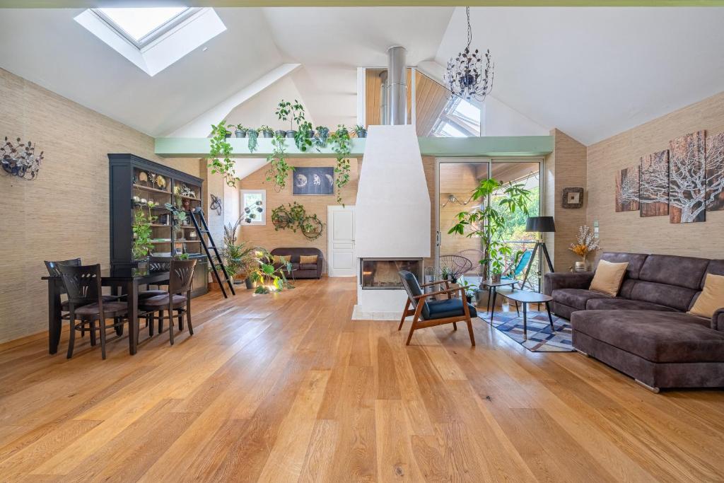 a living room with a couch and a table at Marc's Flat - Calm & Cosy in Nantes