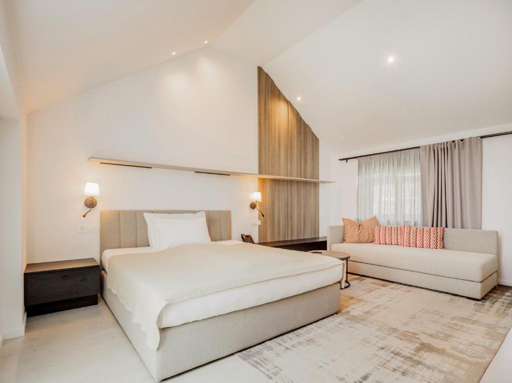 Postel nebo postele na pokoji v ubytování Marshal Hotel Heritage