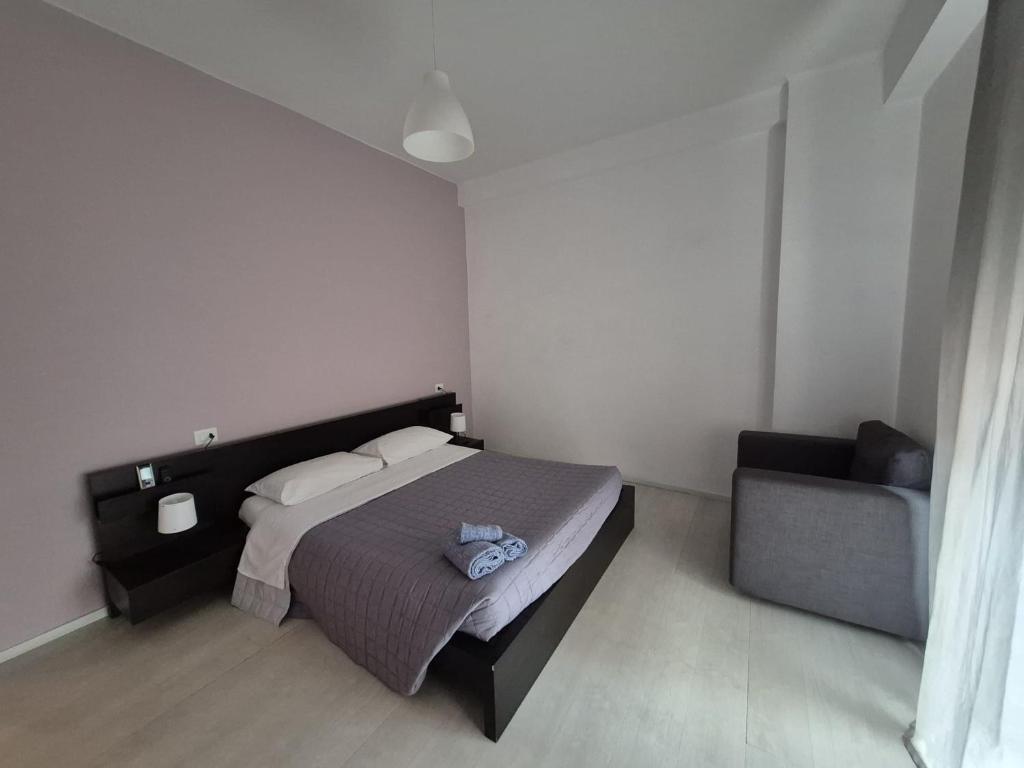 Postel nebo postele na pokoji v ubytování Il Guasco Rooms